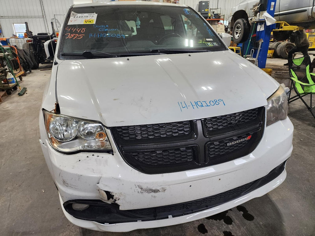 Used Left Headlight Assembly fits: 2014 Dodge Caravan halogen R/T black bezel Le