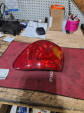 Used Right Tail Light Assembly fits: 2004 Toyota Corolla quarter panel mounted R