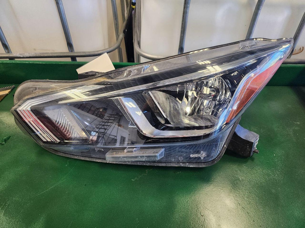 Used Left Headlight Assembly fits: 2021 Nissan Versa halogen Left Grade A