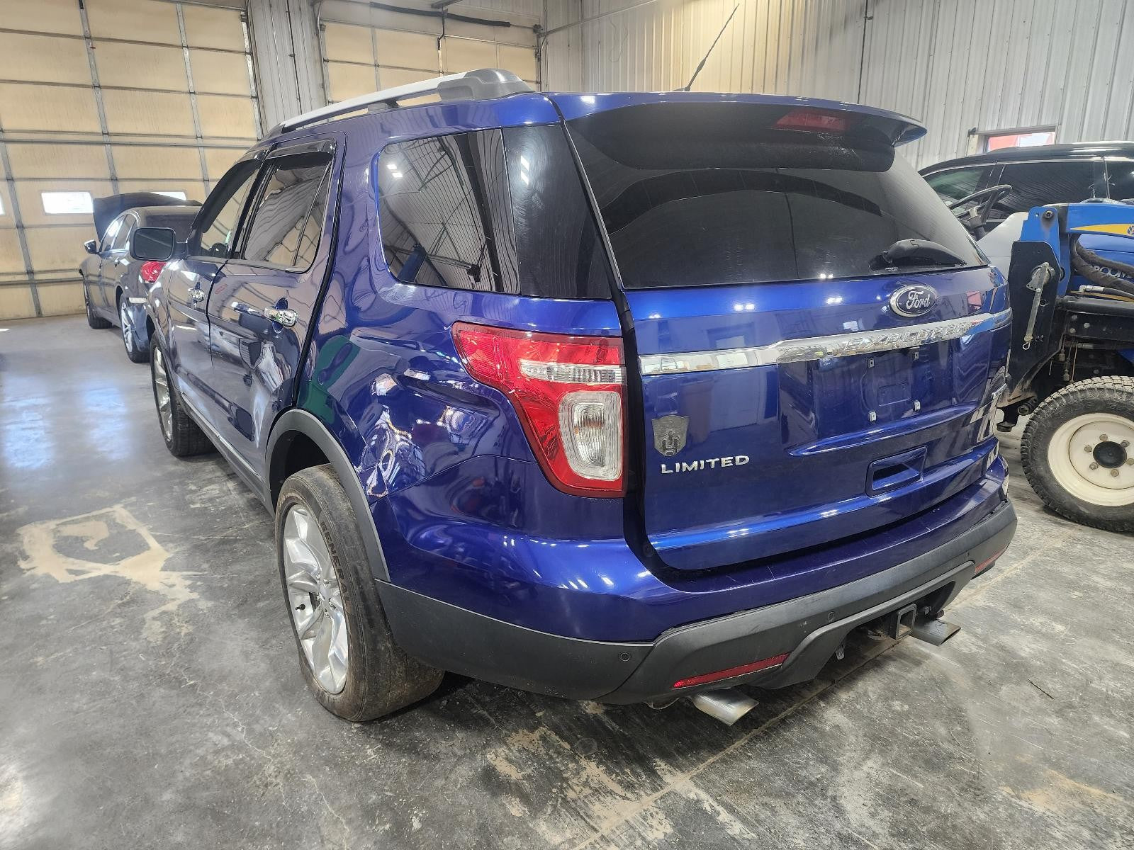 Used Left Tail Light Assembly fits: 2014 Ford Explorer w/o police package red le
