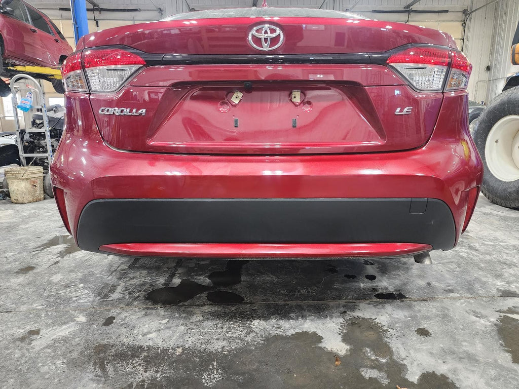 Used Rear Bumper Assembly Rear fits: 2022 Toyota Corolla Sedan gasoline w/o spor