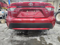 Used Rear Bumper Assembly Rear fits: 2022 Toyota Corolla Sedan gasoline w/o spor