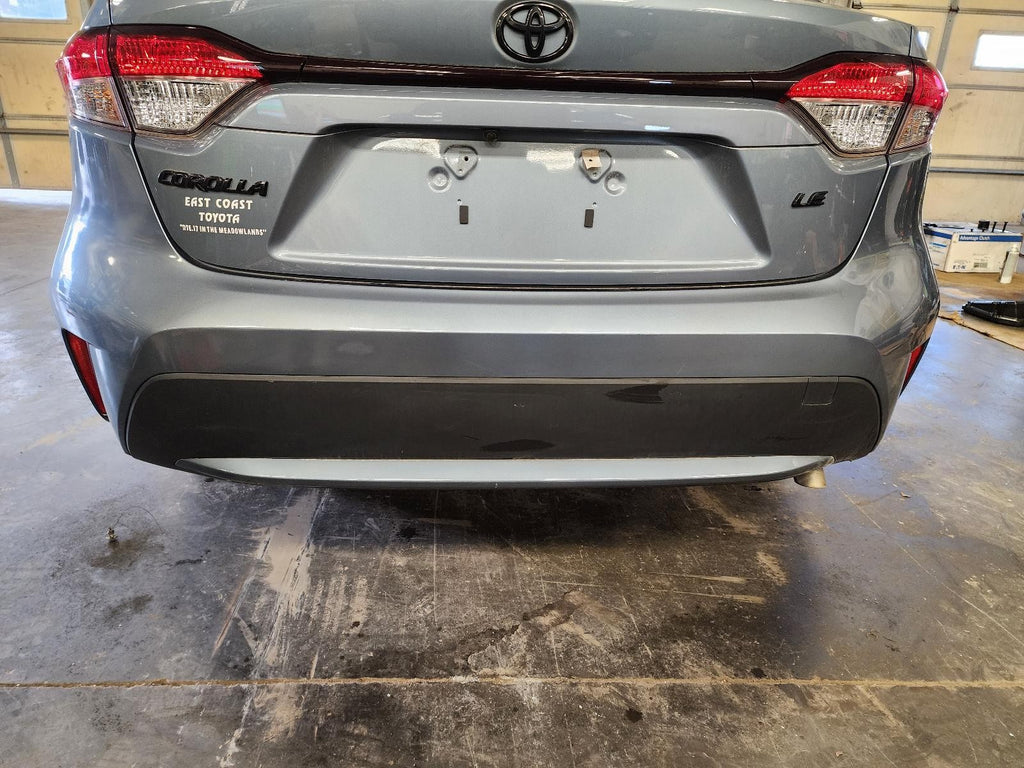 Used Rear Bumper Assembly Rear fits: 2022 Toyota Corolla Sedan gasoline w/o spor