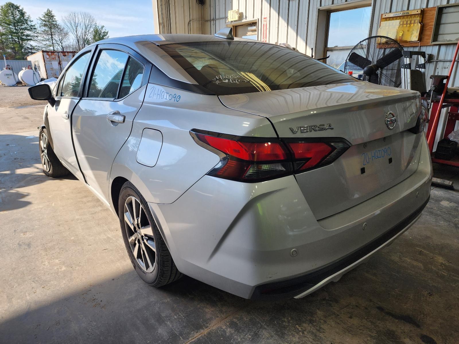 Used Left Tail Light Assembly fits: 2021 Nissan Versa quarter panel mounted Left
