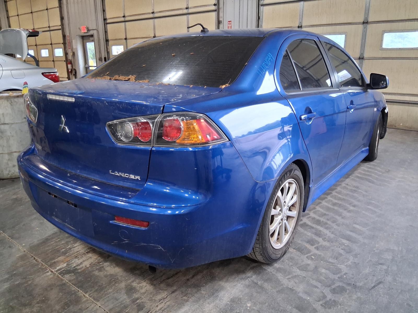 Used Right Door Mirror fits: 2011 Mitsubishi Lancer painted w/o heated Right Gra