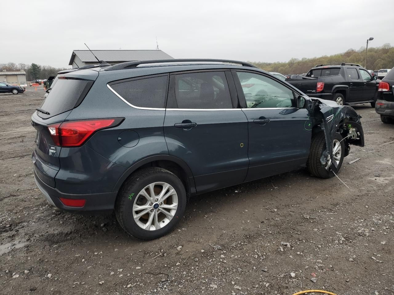 Used Left Tail Light Assembly fits: 2019 Ford Escape quarter panel mounted brigh