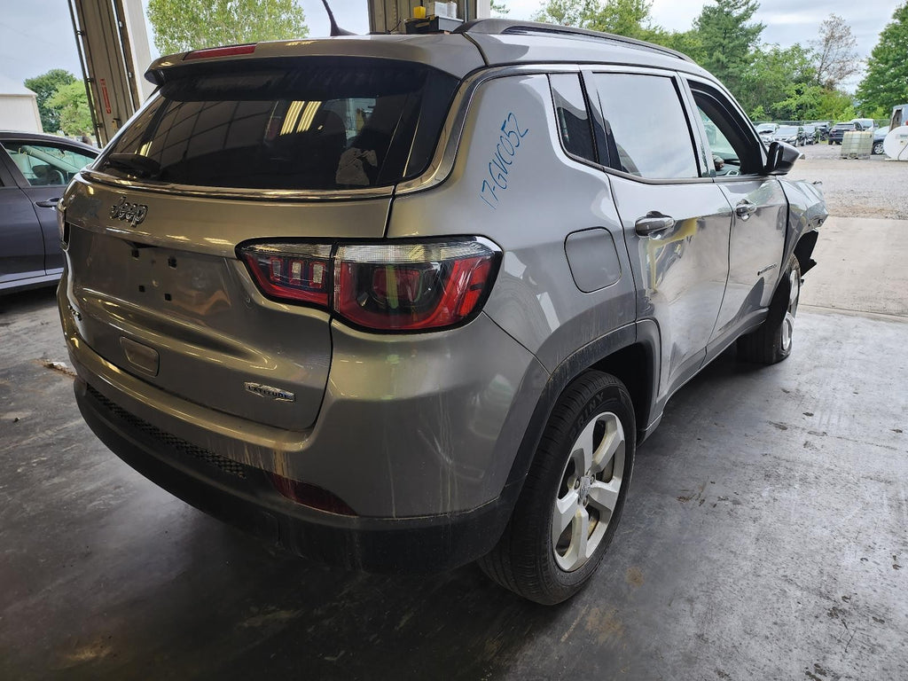 Used Rear Bumper Assembly Rear fits: 2017 Jeep Compass new style horizontal rear
